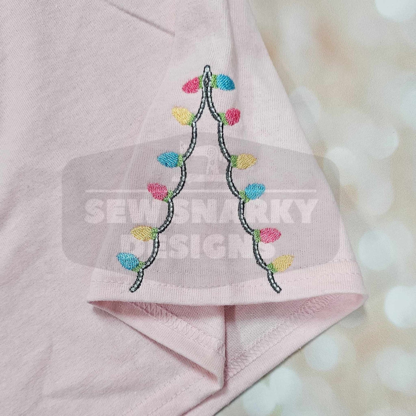 Pastel Nutcracker Christmas T-Shirt with Embroidered Christmas Lights