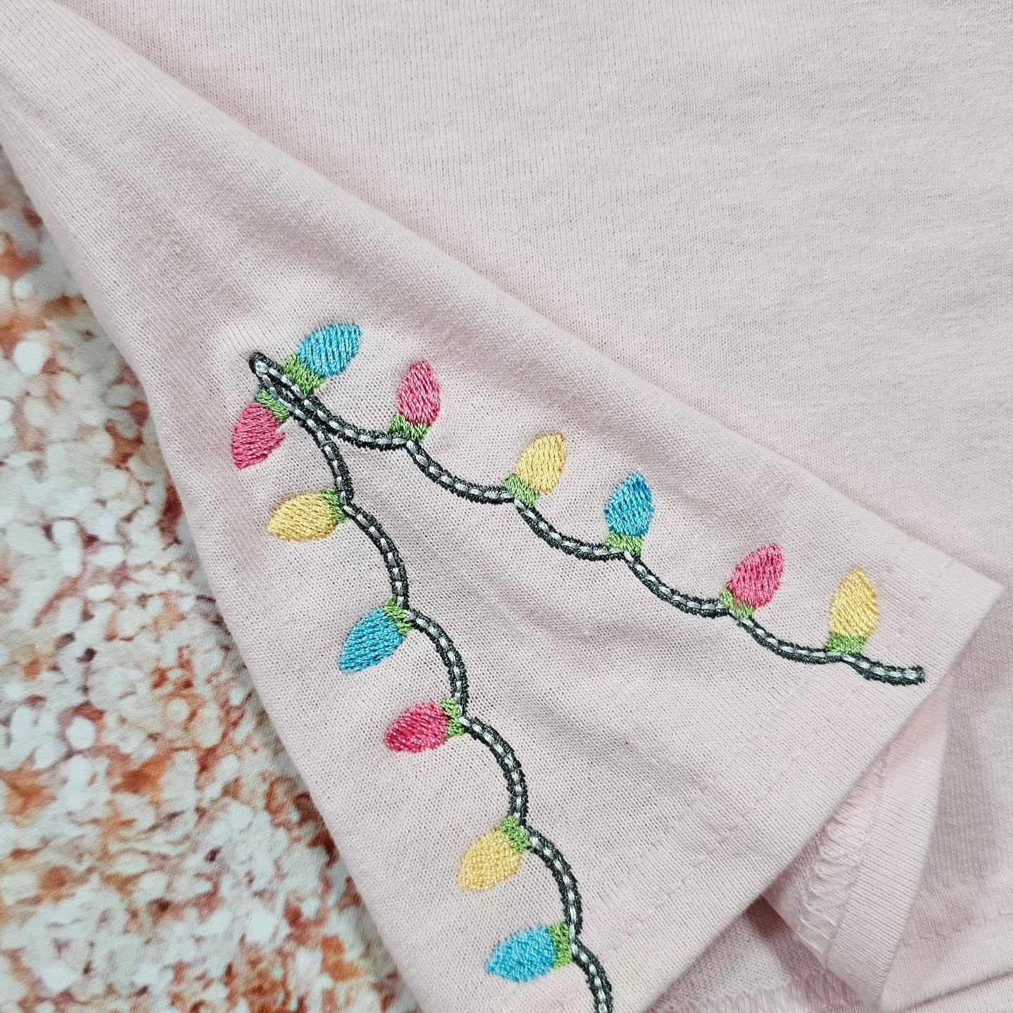 Pastel Nutcracker Christmas T-Shirt with Embroidered Christmas Lights