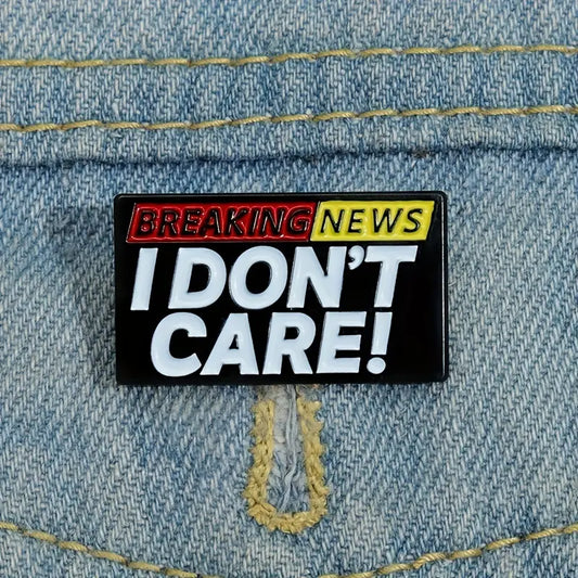 "Breaking News, I Don't Care" Lapel Pin