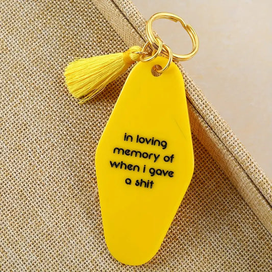 "In loving memory of when I gave a shit" Motel Keychain